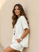 Comfy linen-like shirt and shorts two-piece set in breathable fabric for casual and versatile style