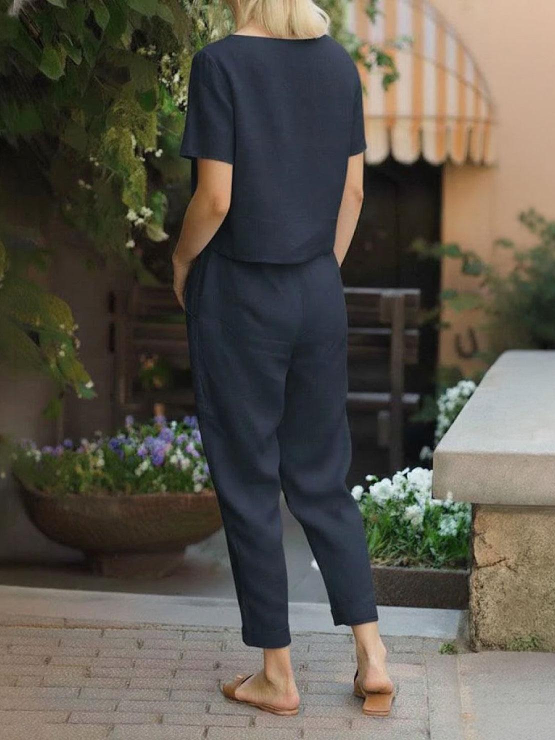 Woman wearing a soft cotton-linen blend monochrome two-piece set with relaxed fit and breathable fabric