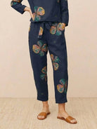 Model wearing cotton-linen monochrome longline top and wide-leg pants set