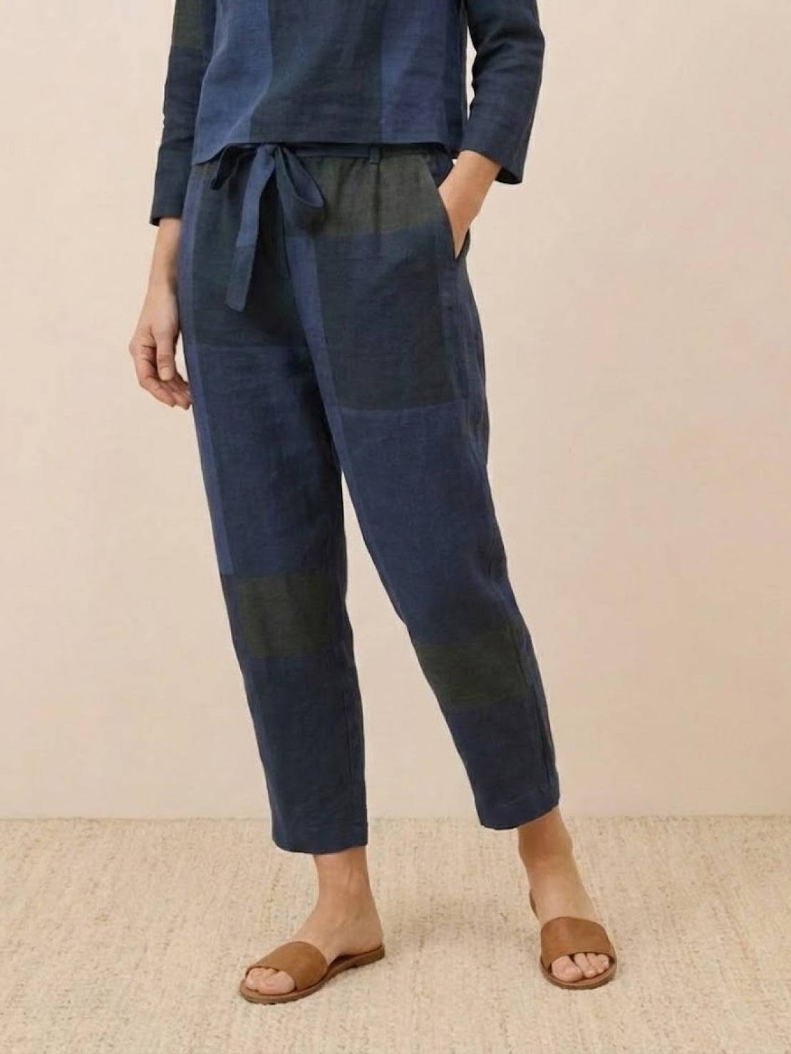 Model wearing relaxed cotton-linen monochrome longline top and wide-leg pants set