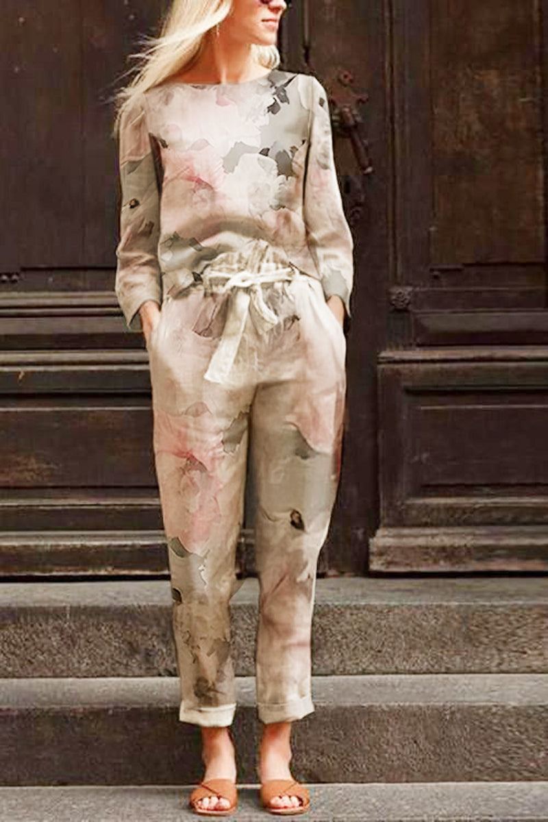 Woman wearing Cotton-Linen Monochrome Capsule relaxed longline top and wide-leg pants with abstract print