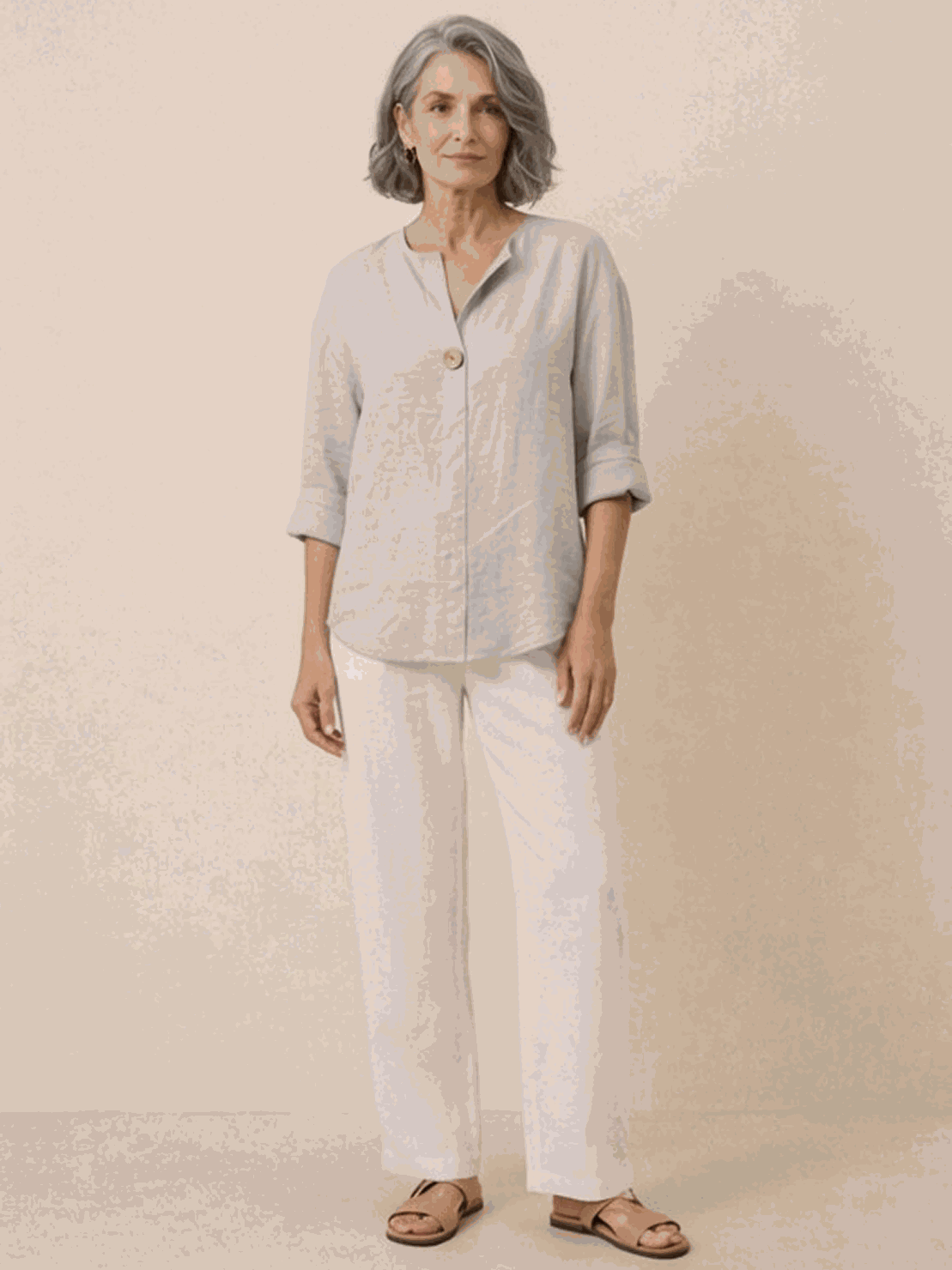 Pure linen age-defying shirt with button detail, breathable and lightweight fabric perfect for warm weather.