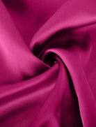 Woman wearing Elegant Layers Two-Piece Set with layered V-neck top and matching pants in soft fabric