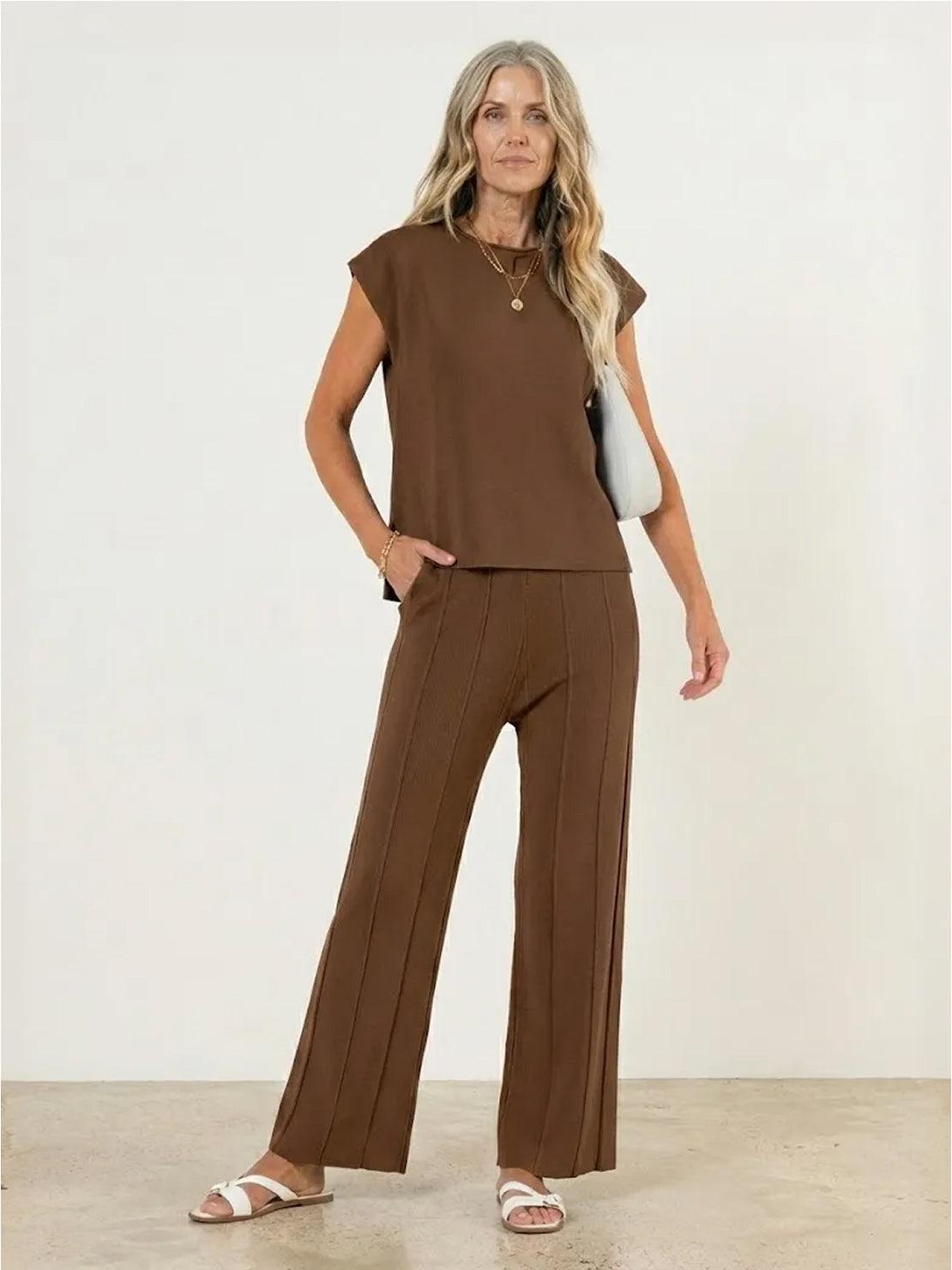 First Class Travel two-piece set with pleated wide-leg pants and matching top in soft viscose-acrylic blend for wrinkle-resistant comfort and style