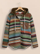 Highland Plaid Shacket with soft fleece lining, hood, and classic button-front closure in cozy plaid pattern