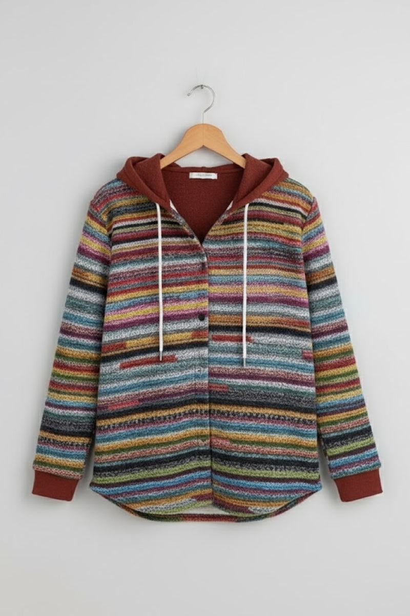 Highland Plaid Shacket with multicolor stripes, attached hood, button-front, and fleece lining, cozy and versatile layering piece for cool weather.