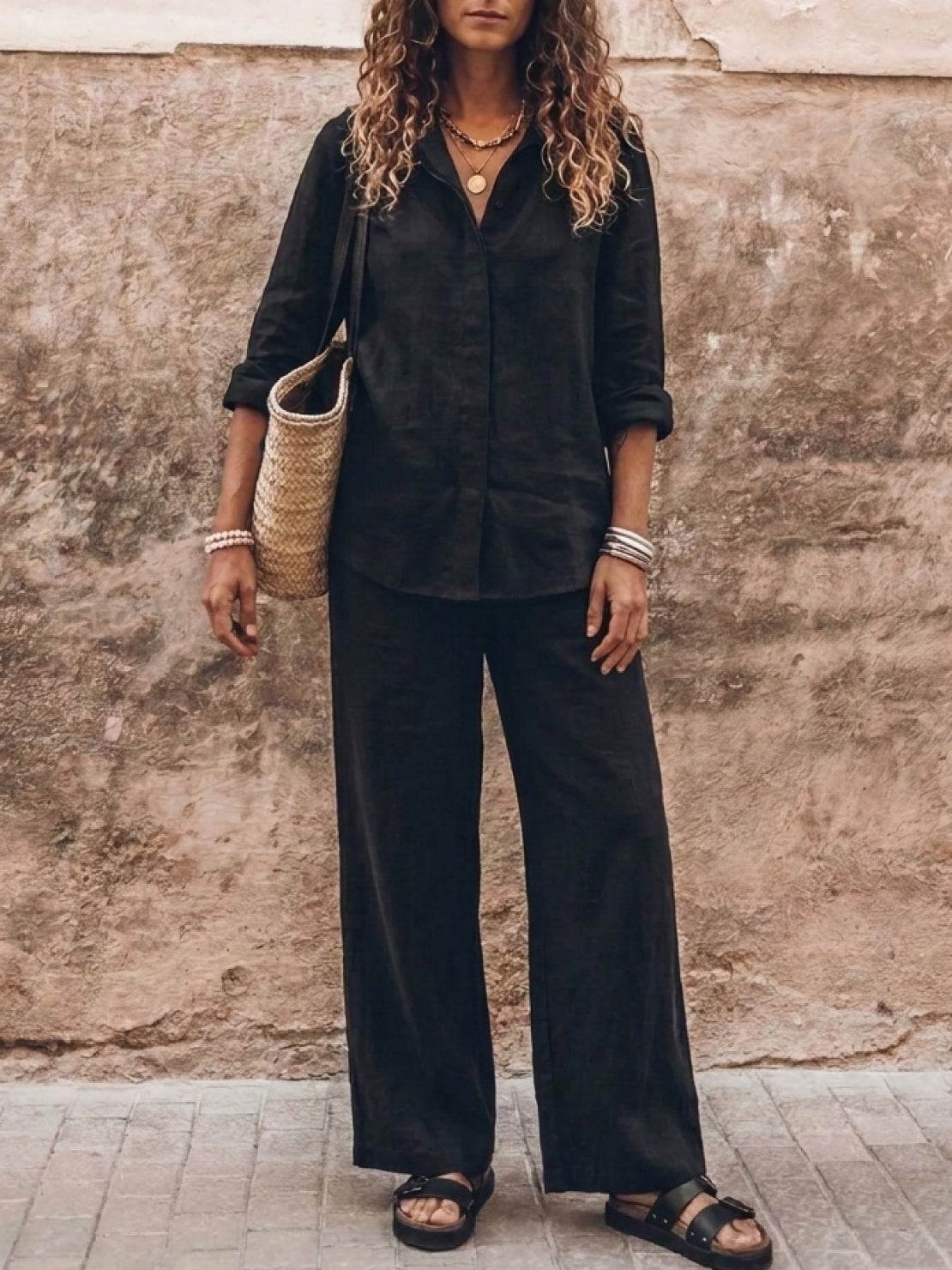 Woman wearing oversized 100% cotton shirt and wide-leg pants co-ord set in a relaxed, breathable style