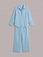 Woman wearing oversized 100% cotton shirt and wide-leg pants co-ord set in relaxed fit