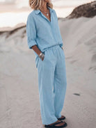 Woman wearing oversized 100% cotton shirt and wide-leg pants co-ord set, relaxed fit, breathable fabric