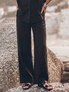Model wearing oversized 100% cotton shirt and wide-leg pants co-ord set in relaxed fit