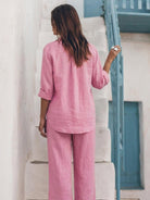 Model wearing oversized 100% cotton shirt and wide-leg pants co-ord set in relaxed fit and breathable fabric