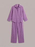 Woman wearing oversized 100% cotton shirt with wide-leg pants co-ord set in relaxed fit