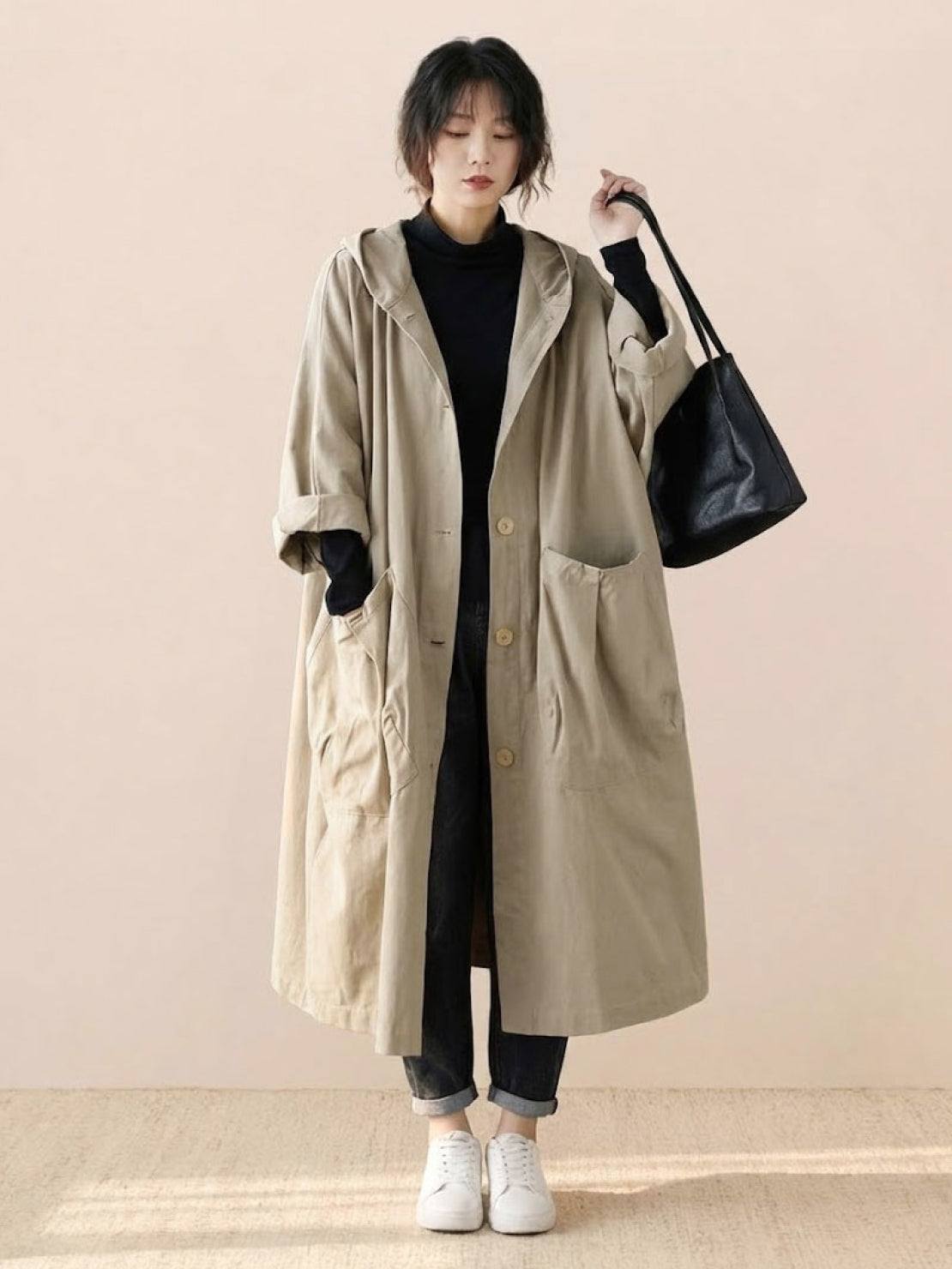 One size oversized water-resistant windbreaker jacket with hood and large pockets in beige waterproof design