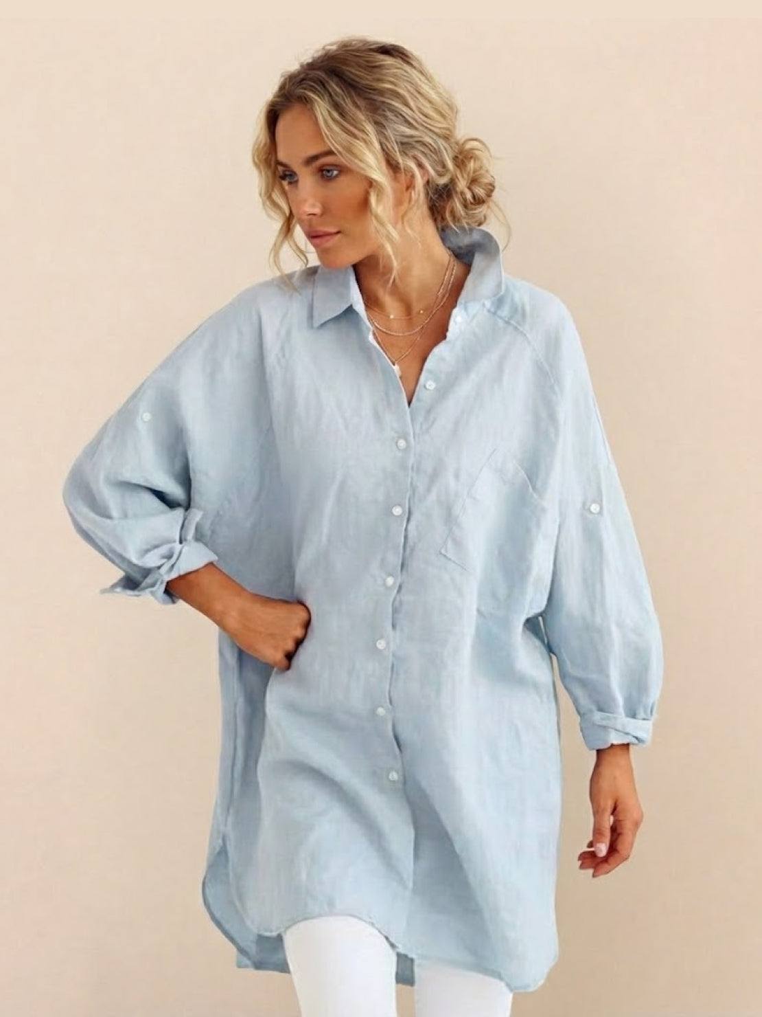Oversized linen shirt in breathable cotton-linen blend with relaxed fit and back button detail