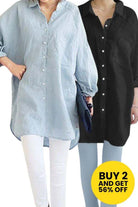 Two oversized linen shirts in light blue and black, loose fit with button-down front and rolled sleeves, styled with white and light blue pants.