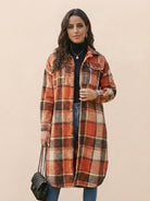 Oversized medium-length blue plaid wool-blend overshirt jacket with relaxed fit and functional pockets