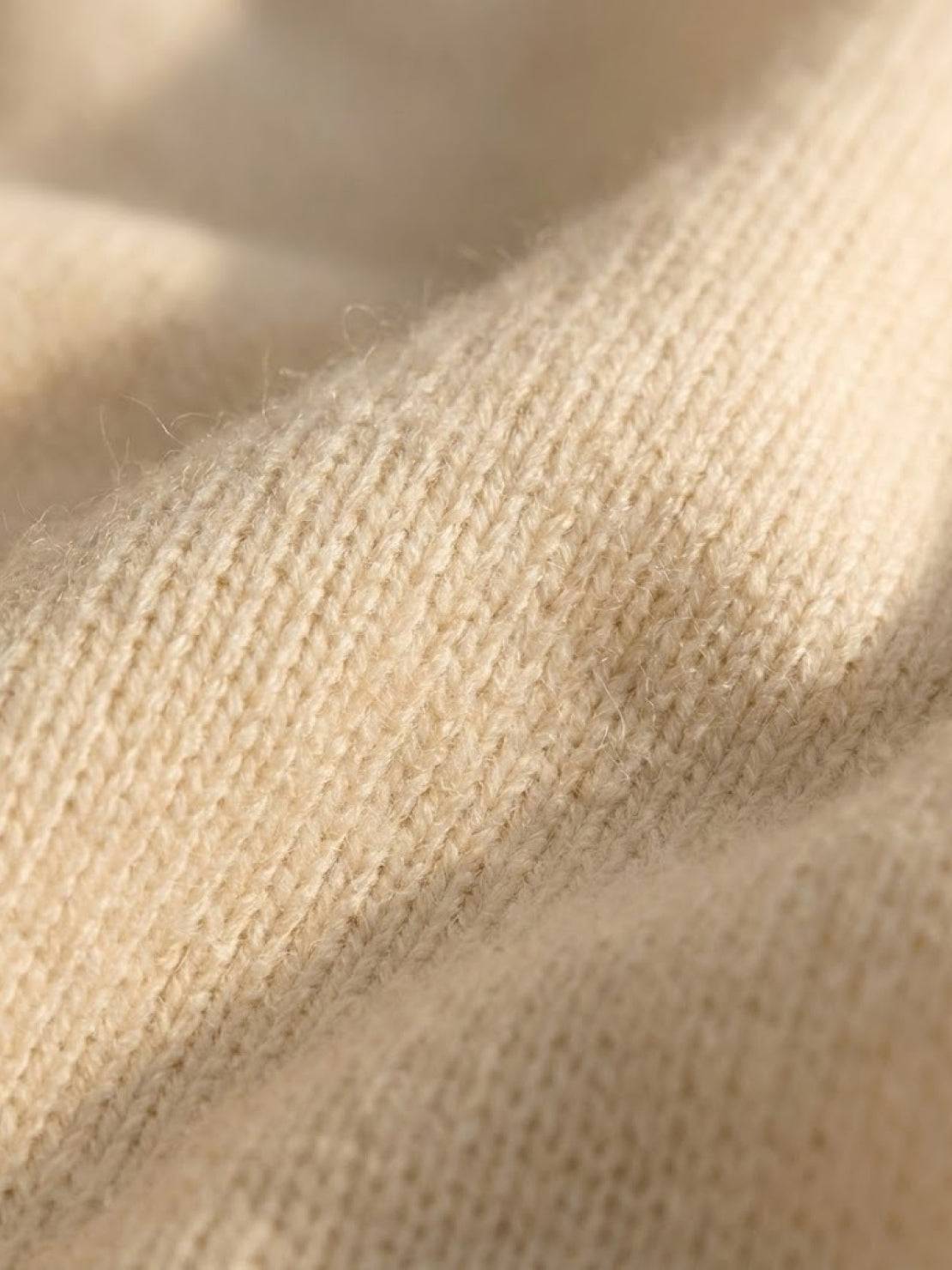 Close-up of soft camel-colored knit fabric from Plush & Preppy Camel Two-Piece Set showing plush texture