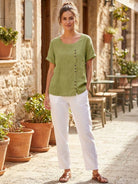 Relaxed Fit Linen Button-Up Tee with breathable cotton, loose fit, short sleeves, round neck, and stylish button detail