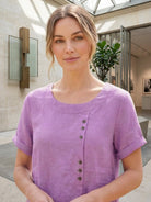 Relaxed fit linen button-up tee with breathable cotton fabric and stylish button detail