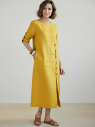 Woman wearing Pure Cotton Elegance dress in soft breathable 100% cotton fabric