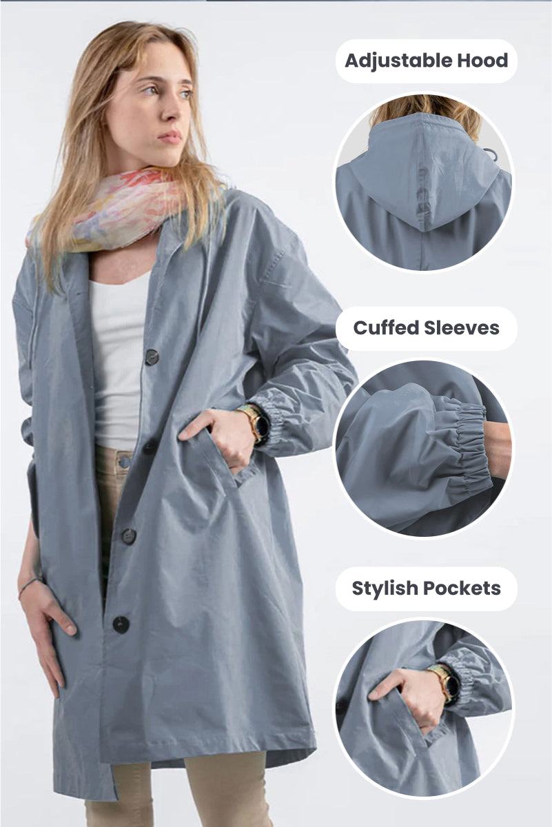 Woman wearing grey Rain Couture Windbreaker with adjustable hood, cuffed sleeves, and stylish pockets