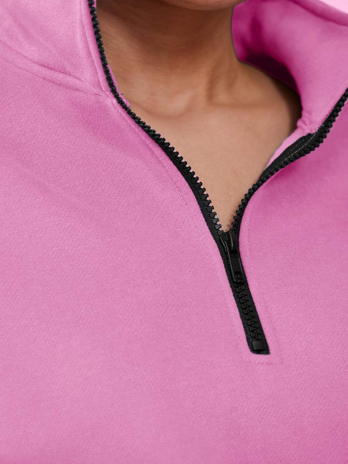 Close-up of pink ultra-soft and comfy co-ord tracksuit set with black zipper detail