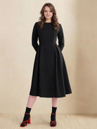 Women's water-repellent A-line hooded raincoat with belt and insulated lining