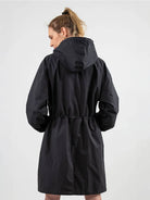 Water-Resistant Oversized Windbreaker rain jacket with hood and multiple pockets for outdoor activities